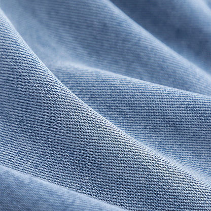 Calyra – Surpiqûres façon jean, tissé extensible, trench-coat